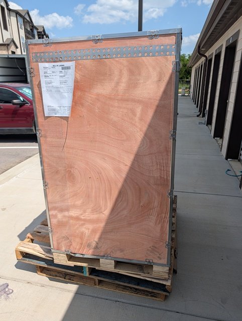 ESW-95 alloy wheel rim straightening machine delivered safely in wooden crate packaging
