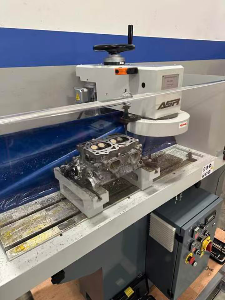 KSM850 cylinder head milling machine machining a cylinder head in customer workshop