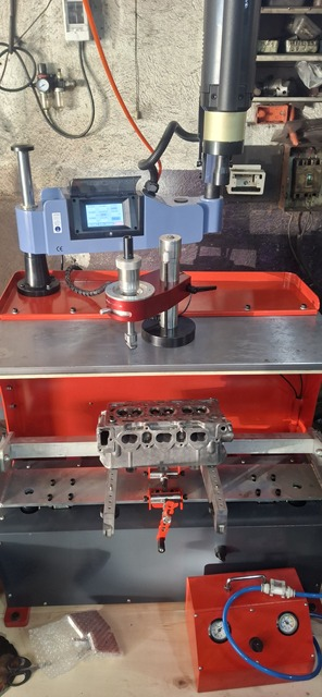 LD2000 portable valve seat boring machine working on cylinder head in customer workshop